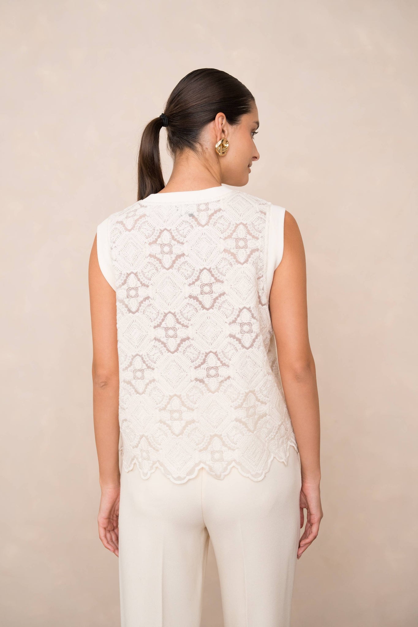 Semi-transparent embroidered lace top