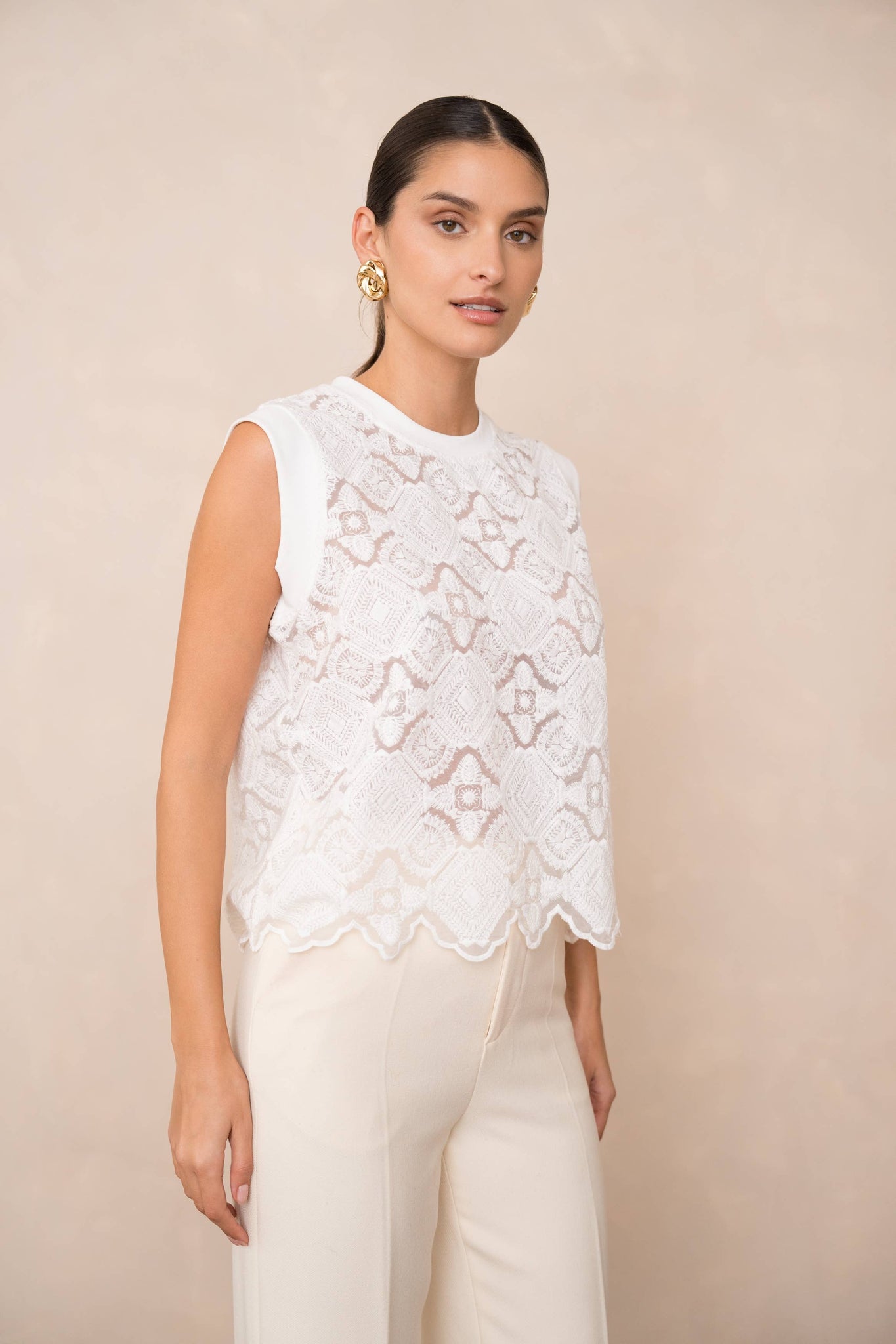 Semi-transparent embroidered lace top