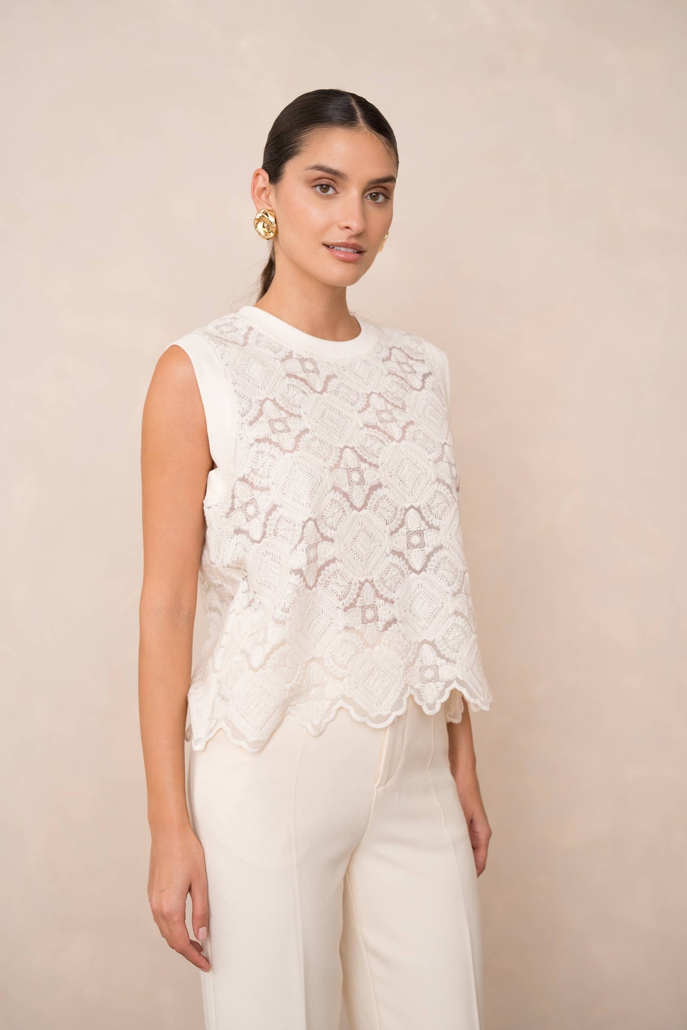 Semi-transparent embroidered lace top